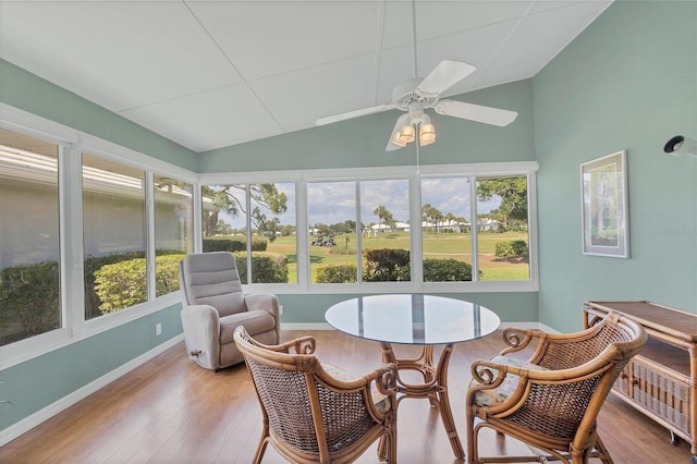 sunroom with a wealth of natural light and ceiling fan