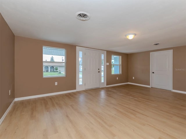 interior space with light hardwood / wood-style flooring