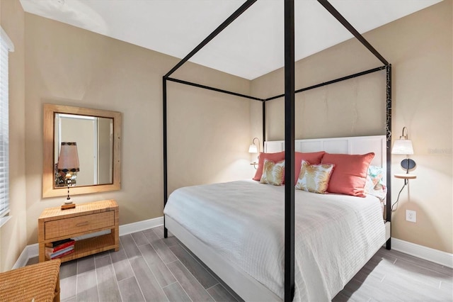 bedroom featuring hardwood / wood-style floors