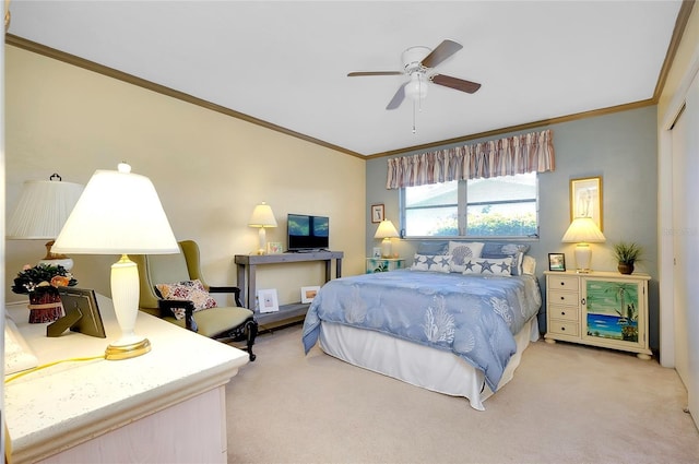 carpeted bedroom featuring crown molding and ceiling fan