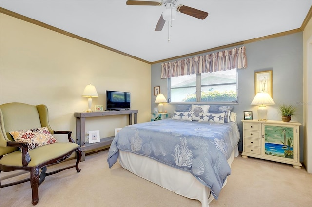 bedroom featuring crown molding, ceiling fan, and light carpet