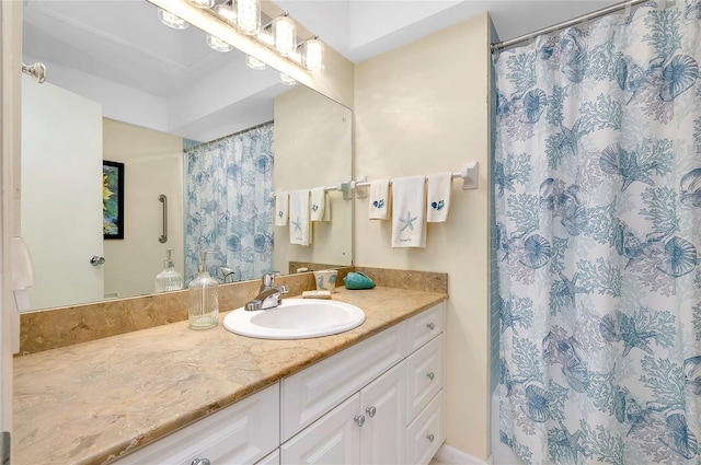 bathroom with vanity and a shower with shower curtain