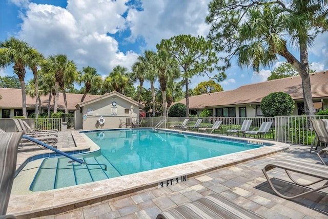 view of swimming pool featuring a patio