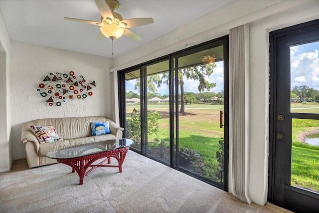 interior space featuring ceiling fan