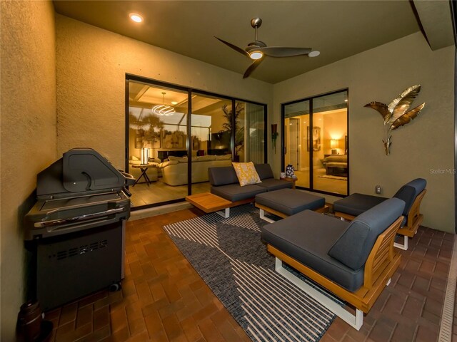 view of patio / terrace featuring ceiling fan, outdoor lounge area, and grilling area