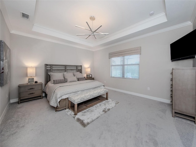 bedroom featuring a raised ceiling, carpet, and ornamental molding