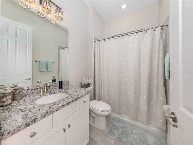 full bathroom with toilet, tile patterned floors, vanity, and shower / tub combo with curtain