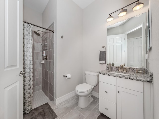 bathroom featuring curtained shower, toilet, and vanity