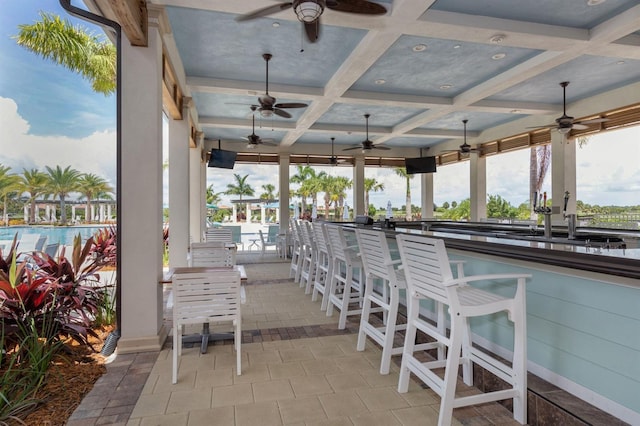 view of patio / terrace featuring an outdoor wet bar