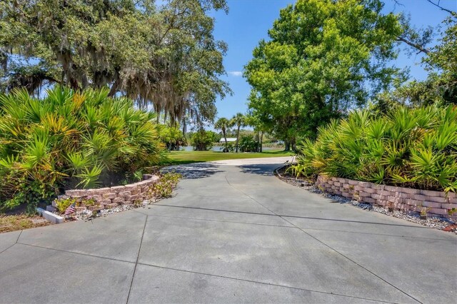 5885 Denison Dr, Venice, FL 34293 - view of concrete driveway