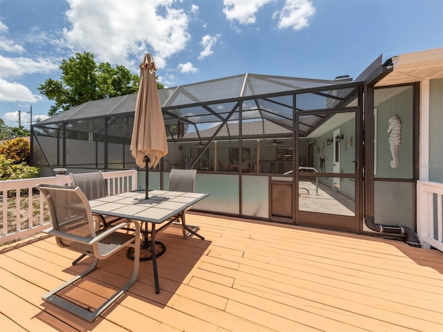 wooden deck featuring a lanai