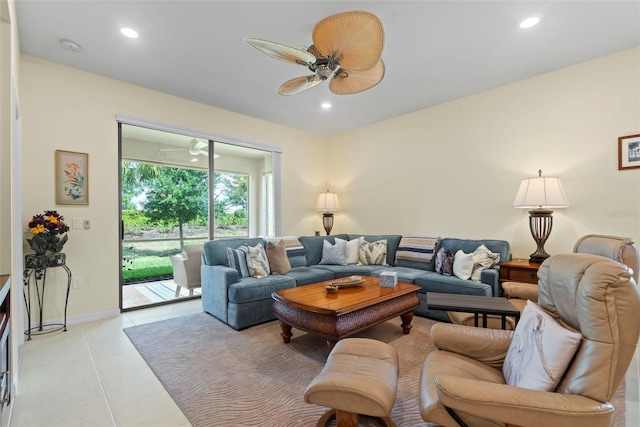 living room with ceiling fan and light tile patterned floors