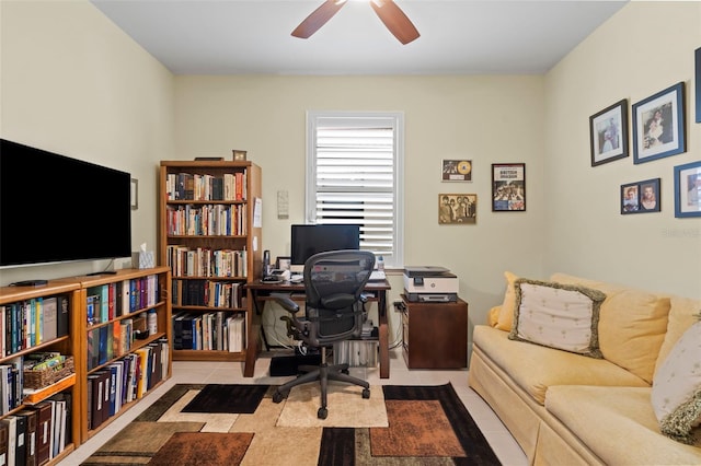 office with ceiling fan and light tile patterned flooring