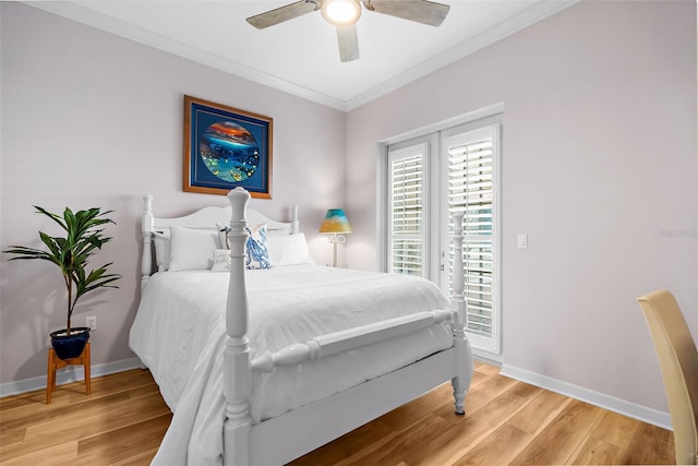 bedroom featuring ceiling fan, wood-type flooring, and ornamental molding