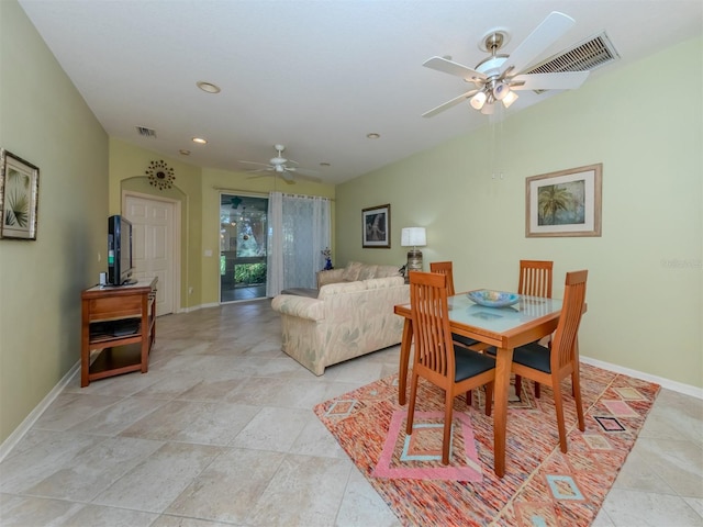 dining space with ceiling fan