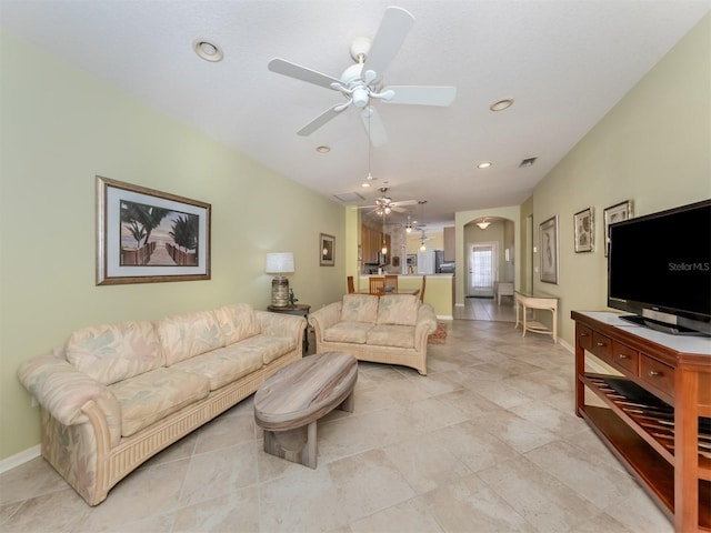 living room with ceiling fan