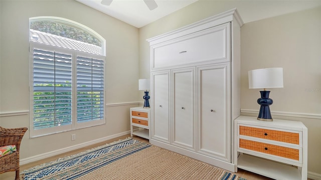 interior space featuring multiple windows and baseboards