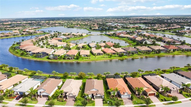 bird's eye view with a water view