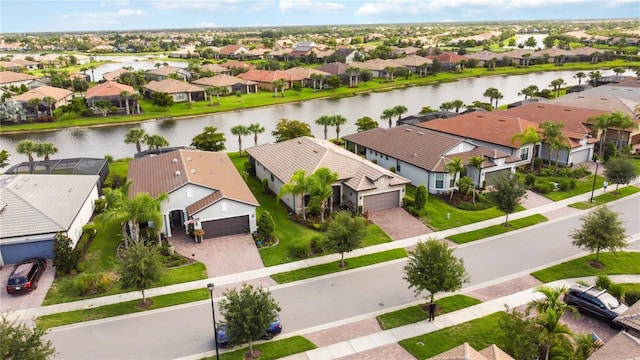 birds eye view of property featuring a water view