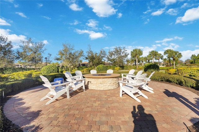 view of patio / terrace with an outdoor fire pit