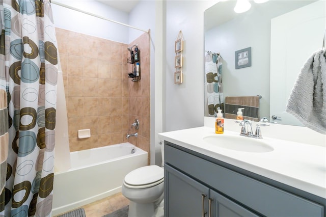 full bathroom featuring vanity, shower / bathtub combination with curtain, tile patterned floors, and toilet