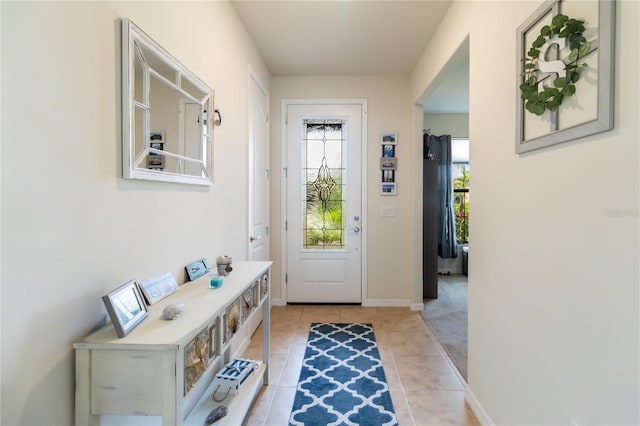 entryway featuring light tile patterned floors