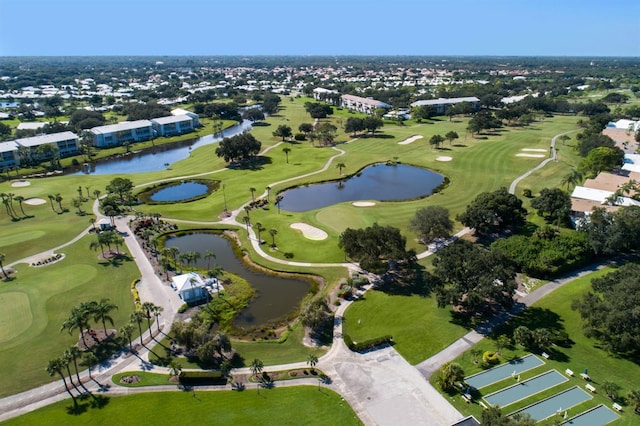 aerial view featuring a water view and view of golf course