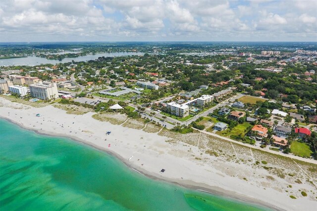 aerial view featuring a beach view and a water view