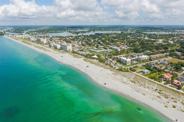 drone / aerial view with a view of the beach and a water view