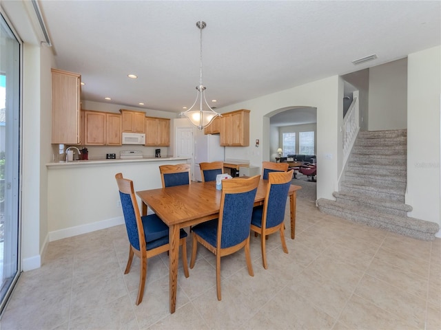 dining area featuring sink