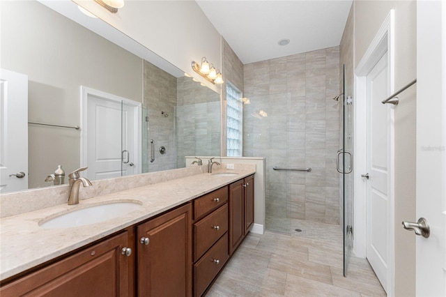 bathroom with vanity and walk in shower