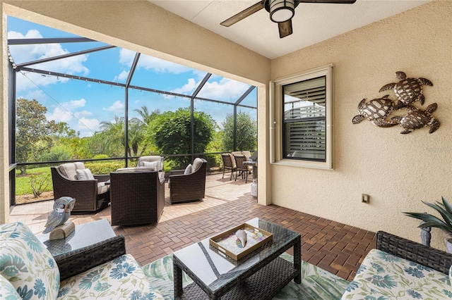 sunroom with ceiling fan