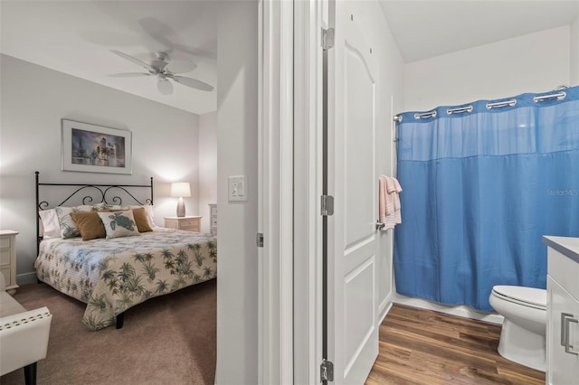 bedroom featuring wood finished floors and a ceiling fan