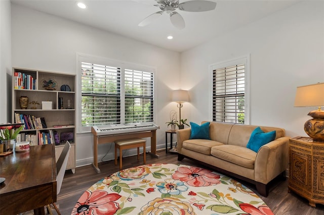 living room featuring recessed lighting, baseboards, wood finished floors, and a ceiling fan