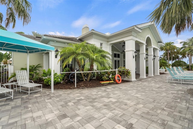 view of patio / terrace with a gazebo and ceiling fan