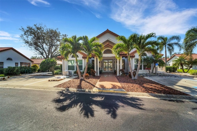 mediterranean / spanish house with french doors