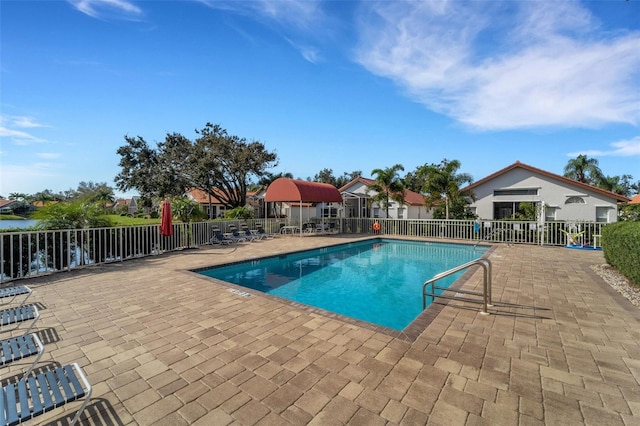 view of swimming pool featuring a patio