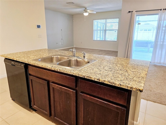 kitchen with sink, ceiling fan, light tile patterned floors, black dishwasher, and dark brown cabinets