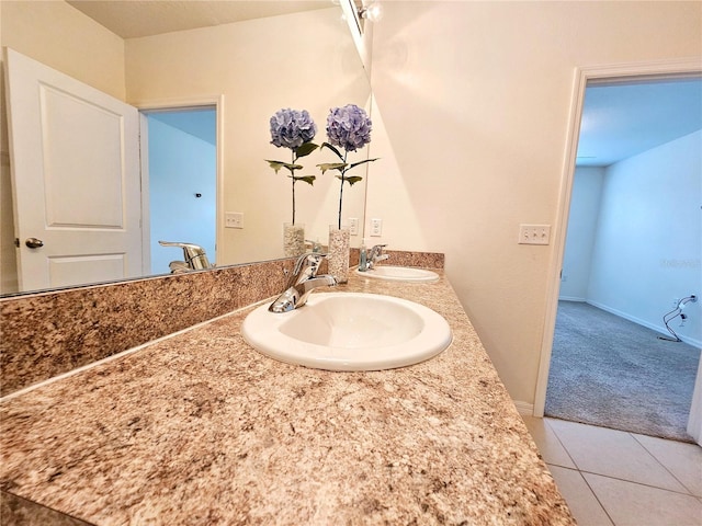 bathroom with tile patterned floors and vanity