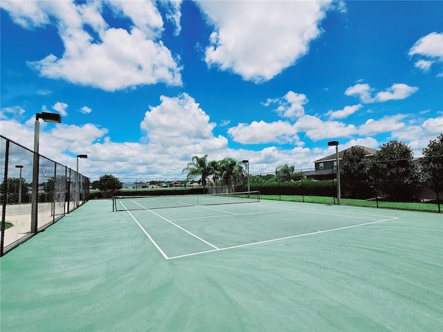 view of tennis court with basketball court