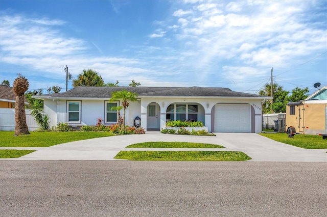 single story home featuring a garage