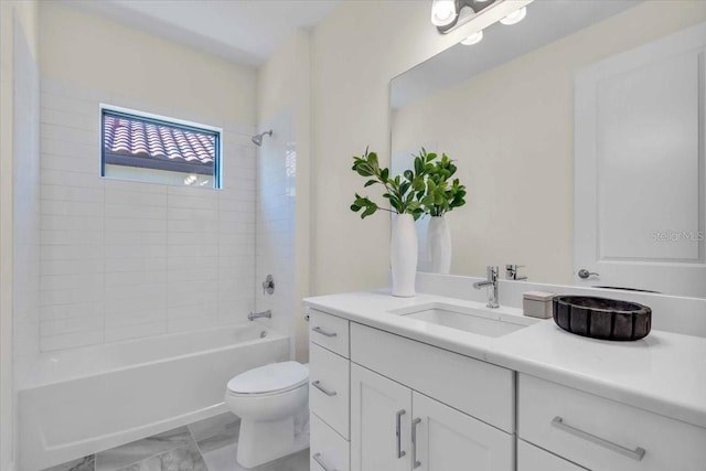 full bathroom featuring tile patterned floors, vanity, tiled shower / bath combo, and toilet