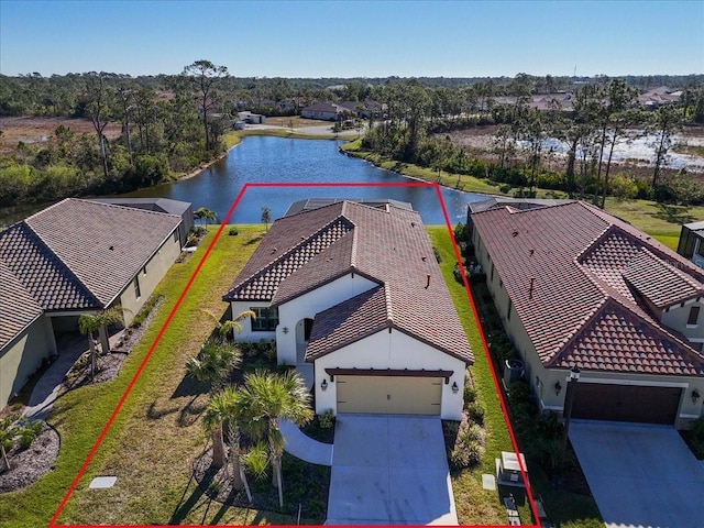 birds eye view of property featuring a water view