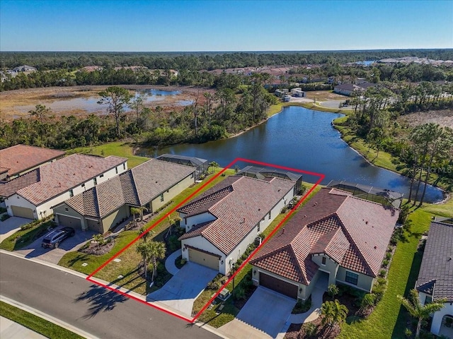 drone / aerial view with a water view