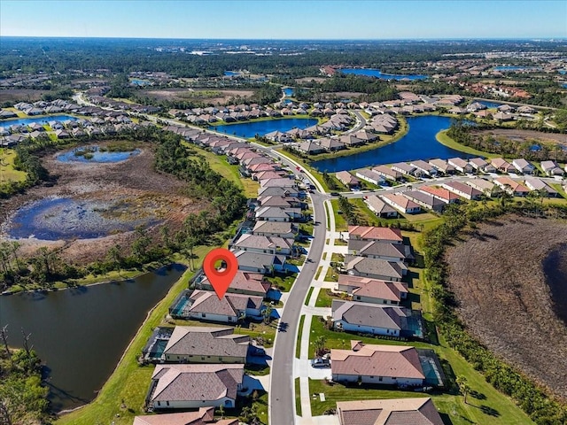 aerial view featuring a water view