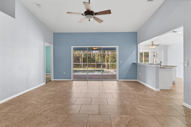 empty room featuring ceiling fan