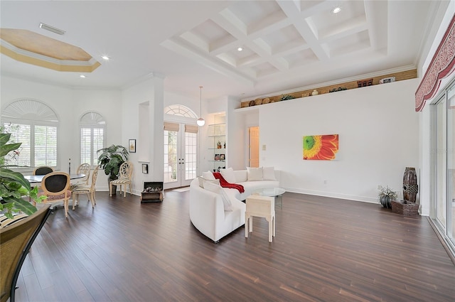 living room featuring french doors, a high ceiling, coffered ceiling, dark hardwood / wood-style flooring, and ornamental molding