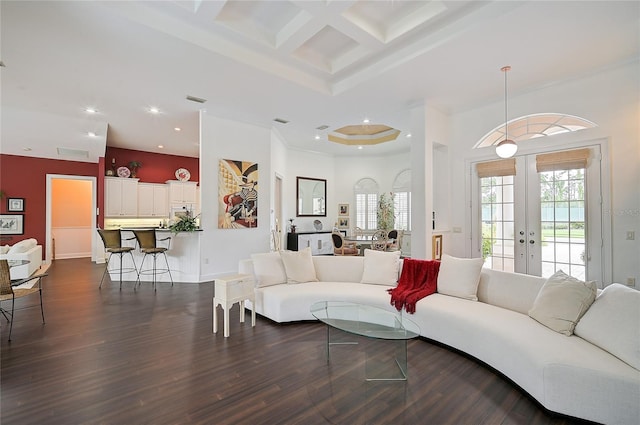 living room with beamed ceiling, french doors, dark wood-type flooring, and coffered ceiling