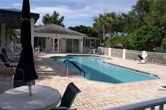 view of pool featuring a patio area