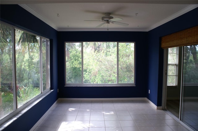 unfurnished sunroom featuring ceiling fan and a wealth of natural light